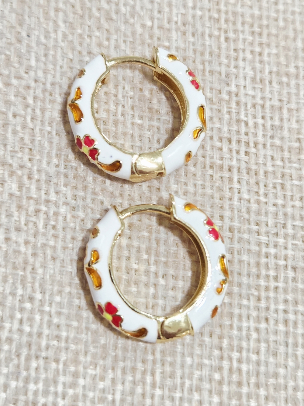 Gold-Tone White Enamel Hoop Earrings with Red & Orange Floral Accents